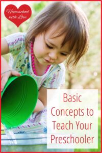 Preschooler pouring water from one bucket into another. Basic Concepts to Teach Your Preschooler.