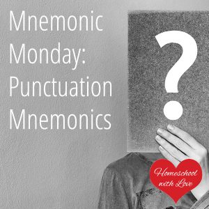 Man holding card with question mark - Mnemonic Monday: Punctuation Mnemonics