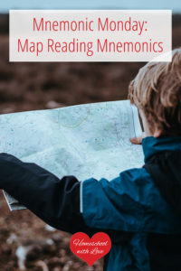 Boy reading map - Map Reading Mnemonics