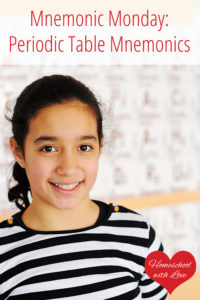 Girl standing in front of periodic table - Periodic Table Mnemonics