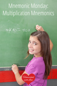 Child doing math problem on chalkboard - Multiplication Mnemonics